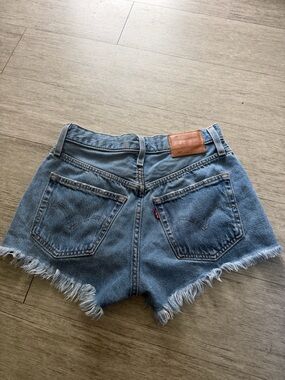 Levi's Medium Blue Denim Frayed Hem Cutoff Shorts